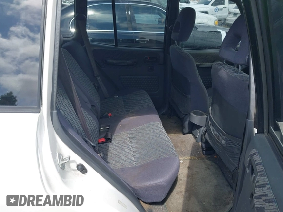 1999 Toyota RAV4 with VIN JT3GP10V7X7057281, listed as a IAAI auction lot 42110228 with 301,749 mi miles and . Bid and sale history available at DreamBid. Image 8.