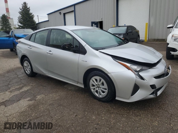 2016 Toyota Prius Two z VIN JTDKBRFU8G3006171, wystawiony jako Copart lot #57156035 z przebiegiem 228 265 mil mil oraz Czysty tytuł • Clean title. Historia ofert i sprzedaży dostępna na DreamBid. Obrazek 4.