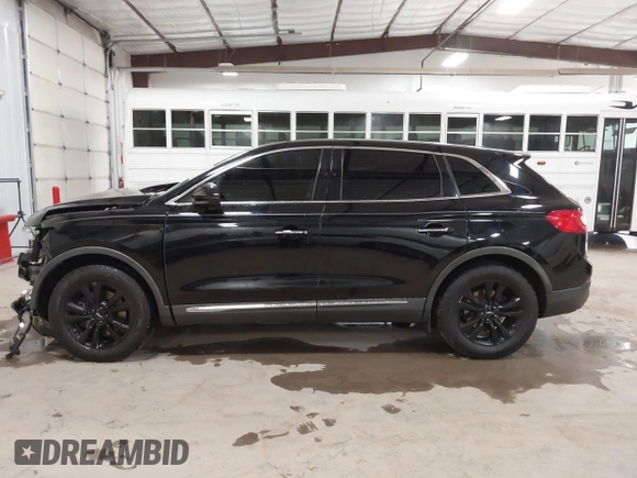 2016 Lincoln MKX Premiere with VIN 2LMTJ6JR4GBL75053, listed as a IAAI auction lot 41020450 with 120,930 mi miles. Bid and sale history available at carsss.com. Image 14.