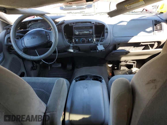 1999 Ford F-150 z VIN 1FTRX18W6XNA10031, wystawiony jako Copart lot #80826354 z przebiegiem Nie podano mil oraz Nie do naprawy • Non repairable. Historia ofert i sprzedaży dostępna na DreamBid. Obrazek 8.