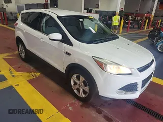 2014 Ford Escape SE z VIN 1FMCU9GX7EUC02600, wystawiony jako IAAI lot #42570755 z przebiegiem 86 871 mil mil oraz . Historia ofert i sprzedaży dostępna na DreamBid. Obrazek 9.