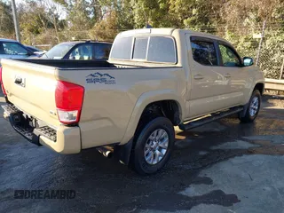 2017 Toyota Tacoma SR5 with VIN 3TMCZ5ANXHM088347, listed as a IAAI auction lot 41591318 with 103,800 mi miles and . Bid and sale history available at DreamBid. Image 4.