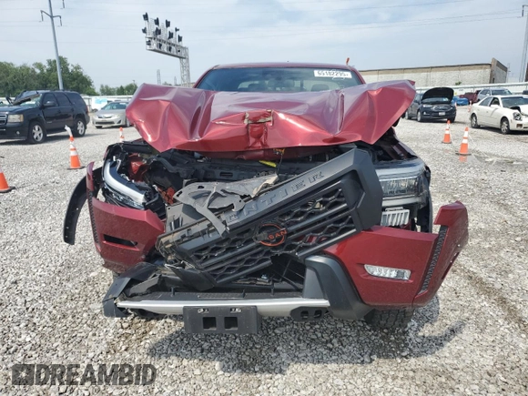 2022 Nissan Frontier Pro-4X with VIN 1N6ED1EK1NN601886, listed as a Copart auction lot 65182295 with 51,879 mi miles and Salvage title. Bid and sale history available at DreamBid. Image 5.