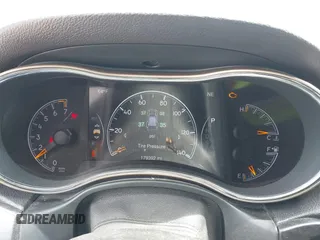 2014 Jeep Grand Cherokee Laredo with VIN 1C4RJFAG8EC440119, listed as a IAAI auction lot 42030855 with 179,392 mi miles and . Bid and sale history available at DreamBid. Image 7.