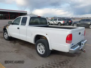 2003 Dodge Dakota SLT z VIN 1D7HL42X33S181413, wystawiony jako IAAI lot #42000892 z przebiegiem Nie podano mil oraz . Historia ofert i sprzedaży dostępna na DreamBid. Obrazek 3.