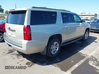 2016 Chevrolet Suburban LT with VIN 1GNSKHKC6GR423963, listed as a IAAI auction lot 42210288 with 151,799 mi miles and . Bid and sale history available at DreamBid. Image 4.
