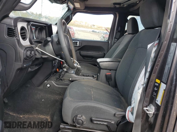 2024 Jeep Wrangler Sport S with VIN 1C4RJXN64RW202828, listed as a Copart auction lot 54202415 with 30,459 mi miles and Salvage title. Bid and sale history available at DreamBid. Image 7.