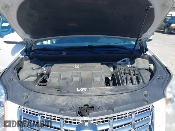 2013 Cadillac SRX Performance Collection with VIN 3GYFNDE33DS637155, listed as a IAAI auction lot 41977706 with 140,668 mi miles and . Bid and sale history available at DreamBid. Image 10.