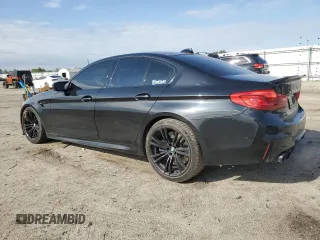 2019 BMW M5 z VIN WBSJF0C53KB447108, wystawiony jako Copart lot #51024275 z przebiegiem 58 387 mil mil oraz Szkoda całkowita • Salvage title. Historia ofert i sprzedaży dostępna na DreamBid. Obrazek 2.