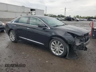 2017 Cadillac XTS Luxury with VIN 2G61M5S34H9163154, listed as a Copart auction lot 52771205 with 182,875 mi miles and Salvage Title. Bid and sale history available at DreamBid. Image 4.