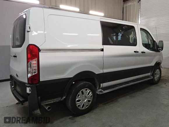 2023 Ford Transit Cargo with VIN 1FTBR1Y86PKA17978, listed as a Copart auction lot 77180324 with 20,173 mi miles and Clean Title. Bid and sale history available at DreamBid. Image 3.