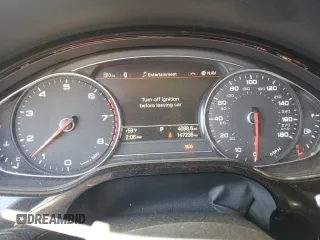 2014 Audi A8 3.0T z VIN WAURGAFD5EN007438, wystawiony jako Copart lot #47979945 z przebiegiem 147 236 mil mil oraz Szkody całkowita. Historia ofert i sprzedaży dostępna na DreamBid. Obrazek 9.