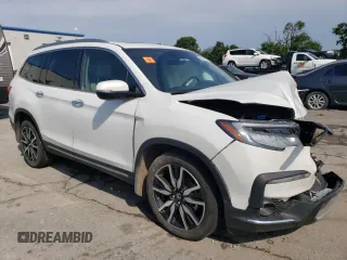 2022 Honda Pilot Touring 7-Passenger with VIN 5FNYF6H64NB054732, listed as a Copart auction lot 63036104 with 33,252 mi miles and Salvage Title. Bid and sale history available at carsss.com. Image 4.