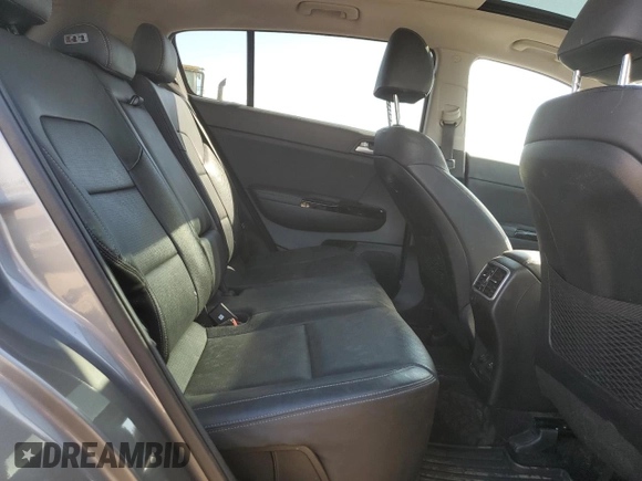 2019 Kia Sportage EX z VIN KNDPNCAC3K7547199, wystawiony jako Copart lot #53388485 z przebiegiem 74 727 mil mil oraz Szkoda całkowita • Salvage title. Historia ofert i sprzedaży dostępna na DreamBid. Obrazek 11.
