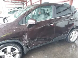 2015 Chevrolet Trax LTZ with VIN KL7CJTSB9FB147244, listed as a IAAI auction lot 41722081 with 125,675 mi miles. Bid and sale history available at carsss.com. Image 6.