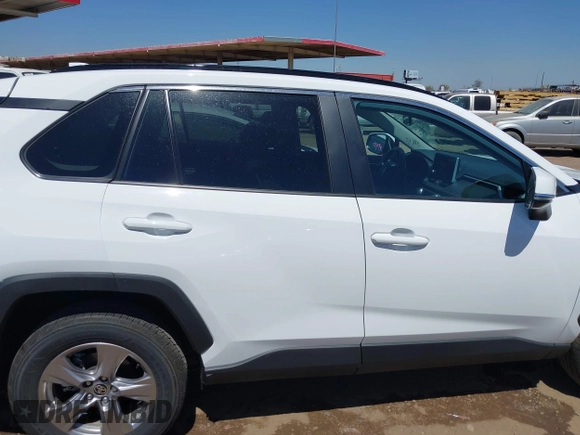 2025 Toyota RAV4 XLE with VIN 2T3W1RFV8SW374059, listed as a IAAI auction lot 42121740 with 7,228 mi miles. Bid and sale history available at carsss.com. Image 13.