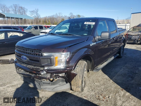 2020 Ford F-150 XL with VIN 1FTEW1CP3LFB61043, listed as a Copart auction lot 86164934 with 128,305 mi miles and Salvage Title. Bid and sale history available at carsss.com. Image 1.