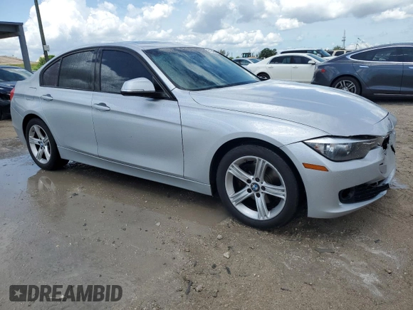 2013 BMW 3 Series 328i with VIN WBA3C1G52DNR49440, listed as a Copart auction lot 61546685 with 118,308 mi miles and Salvage title. Bid and sale history available at DreamBid. Image 4.