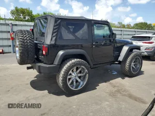 2014 Jeep Wrangler Sport with VIN 1C4AJWAG1EL200181, listed as a Copart auction lot 61165595 with 101,234 mi miles and Salvage title. Bid and sale history available at DreamBid. Image 3.