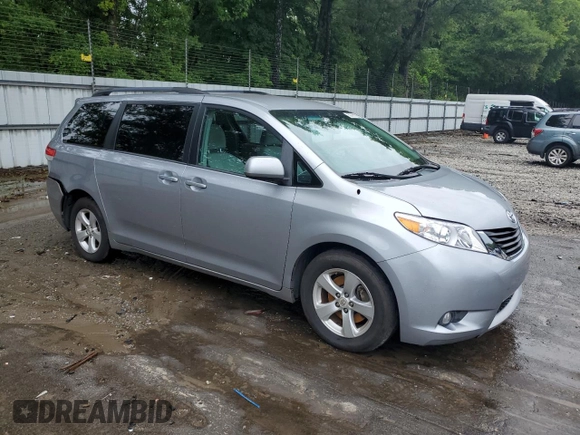 2012 Toyota Sienna LE AAS with VIN 5TDKK3DC8CS224112, listed as a Copart auction lot 59701725 with 200,726 mi miles and Salvage title. Bid and sale history available at DreamBid. Image 4.
