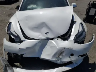 2023 Tesla Model 3 с VIN 5YJ3E1EA3PF575985, выставлен на аукционе Copart как лот 56001075 с пробегом 54 640 миль миль и Списание • Salvage title. История ставок и продаж доступна на DreamBid. Изображение 11.