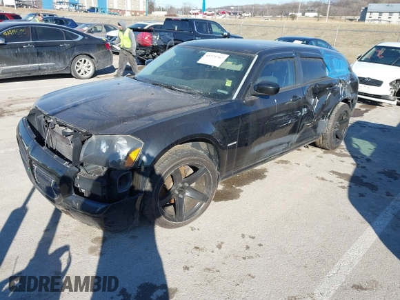 2005 Dodge Magnum RT with VIN 2D4GV58215H587205, listed as a IAAI auction lot 41371767 with 115,534 mi miles and . Bid and sale history available at carsss.com. Image 2.