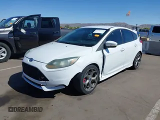 2014 Ford Focus ST with VIN 1FADP3L92EL341579, listed as a IAAI auction lot 42106528 with 104,150 mi miles and . Bid and sale history available at carsss.com. Image 2.