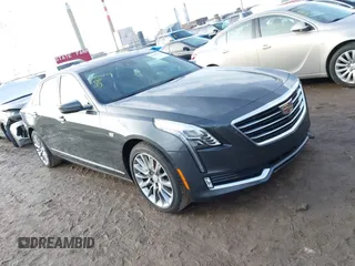 2017 Cadillac CT6 Luxury AWD z VIN 1G6KE5R62HU195184, wystawiony jako IAAI lot #41454042 z przebiegiem 112 454 mil mil oraz . Historia ofert i sprzedaży dostępna na DreamBid. Obrazek 1.