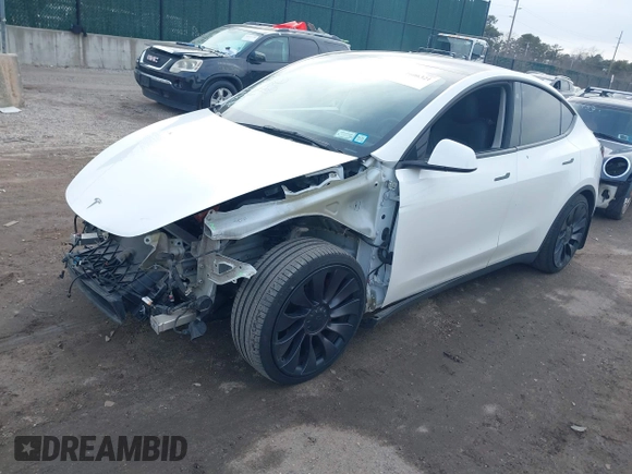 2021 Tesla Model Y Performance with VIN 5YJYGDEF1MF262930, listed as a IAAI auction lot 41606321 with 28,882 mi miles and . Bid and sale history available at DreamBid. Image 21.