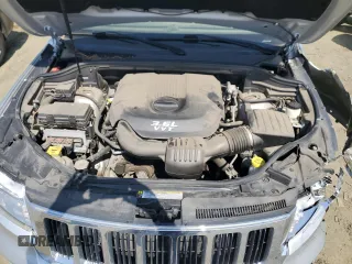 2012 Jeep Grand Cherokee Laredo with VIN 1C4RJFAG4CC123354, listed as a Copart auction lot 52711295 with 151,004 mi miles and Salvage Title. Bid and sale history available at carsss.com. Image 12.