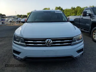 2018 Volkswagen Tiguan SEL z VIN 3VV2B7AXXJM009697, wystawiony jako Copart lot #66335425 z przebiegiem 129 117 mil mil oraz Czysty tytuł • Clean title. Historia ofert i sprzedaży dostępna na DreamBid. Obrazek 5.
