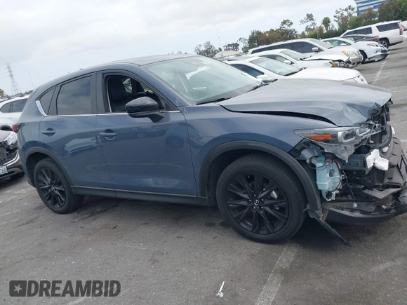 2024 Mazda CX-5 2.5 S Carbon Edition with VIN JM3KFBCL6R0482860, listed as a IAAI auction lot 42108547 with 30,802 mi miles. Bid and sale history available at carsss.com. Image 14.