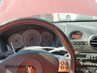 2007 Pontiac Grand Prix z VIN 2G2WP552771232143, wystawiony jako Copart lot #54544505 z przebiegiem 227 706 mil mil oraz Nie do naprawy. Historia ofert i sprzedaży dostępna na DreamBid. Obrazek 9.