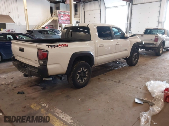 2021 Toyota Tacoma SR z VIN 5TFCZ5AN1MX268370, wystawiony jako IAAI lot #41922632 z przebiegiem 50 358 mil mil oraz . Historia ofert i sprzedaży dostępna na DreamBid. Obrazek 4.