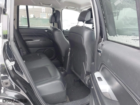 2016 Jeep Compass High Altitude Edition with VIN 1C4NJDEB8GD758174, listed as a IAAI auction lot 41235089 with 144,841 mi miles. Bid and sale history available at carsss.com. Image 8.