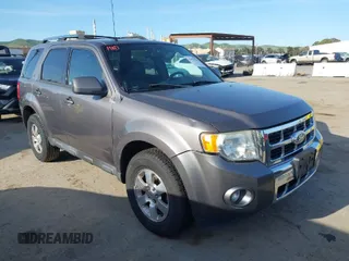 2011 Ford Escape Limited with VIN 1FMCU0EG0BKA82063, listed as a IAAI auction lot 41993781 with 156,991 mi miles. Bid and sale history available at carsss.com. Image 1.