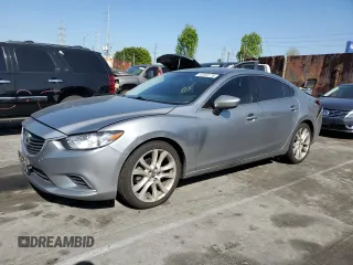 2014 Mazda Mazda6 i Touring with VIN JM1GJ1T68E1145743, listed as a Copart auction lot 52058775 with 324,652 mi miles and Salvage Title. Bid and sale history available at carsss.com. Image 1.