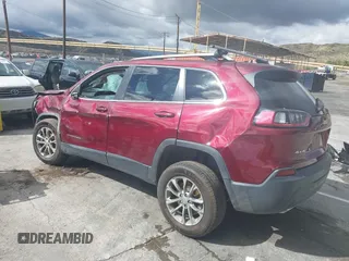2019 Jeep Cherokee Latitude Plus with VIN 1C4PJMLX8KD330606, listed as a IAAI auction lot 41733246 with 94,408 mi miles. Bid and sale history available at carsss.com. Image 3.