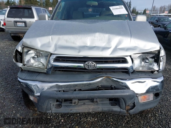 1999 Toyota 4Runner SR5 z VIN JT3HN86R0X0196528, wystawiony jako IAAI lot #41666499 z przebiegiem 294 216 mil mil oraz . Historia ofert i sprzedaży dostępna na DreamBid. Obrazek 6.