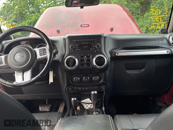 2012 Jeep Wrangler Unlimited Sport with VIN 1C4BJWDG5CL289329, listed as a Copart auction lot 65816775 with 152,632 mi miles and Clean title. Bid and sale history available at DreamBid. Image 9.