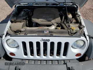 2012 Jeep Wrangler Sport с VIN 1C4AJWAG0CL219303, выставлен на аукционе Copart как лот 55102115 с пробегом 104 003 миль миль и Списание • Salvage title. История ставок и продаж доступна на DreamBid. Изображение 12.
