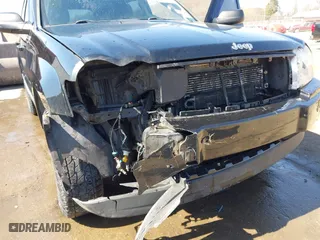 2007 Jeep Grand Cherokee Laredo with VIN 1J8GR48K67C523705, listed as a IAAI auction lot 41774281 with 215,572 mi miles. Bid and sale history available at carsss.com. Image 6.
