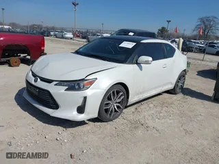 2016 Scion tC with VIN JTKJF5C70GJ019590, listed as a IAAI auction lot 41798426 with 69,045 mi miles. Bid and sale history available at carsss.com. Image 2.
