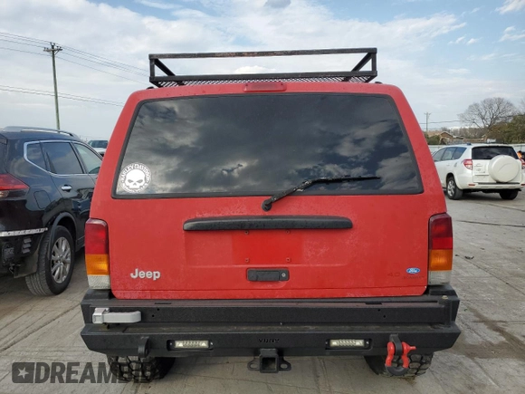 1997 Jeep Cherokee Country with VIN 1J4FJ78S3VL520344, listed as a Copart auction lot 77798264 with 0 mi miles and Salvage Title. Bid and sale history available at carsss.com. Image 6.