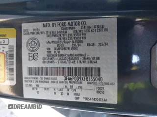2015 Ford Fusion Titanium with VIN 3FA6P0D9XFR155040, listed as a IAAI auction lot 41423022 with 148,365 mi miles. Bid and sale history available at carsss.com. Image 9.