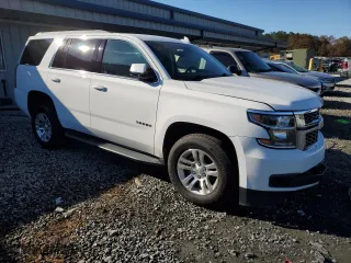 2017 Chevrolet Tahoe LS with VIN 1GNSCAKC7HR355274, listed as a Copart auction lot 85271454 with 104,897 mi miles and Salvage Title. Bid and sale history available at carsss.com. Image 4.