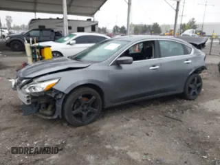 2016 Nissan Altima SR z VIN 1N4AL3AP5GC247702, wystawiony jako IAAI lot #41868357 z przebiegiem 164 688 mil mil oraz . Historia ofert i sprzedaży dostępna na DreamBid. Obrazek 18.
