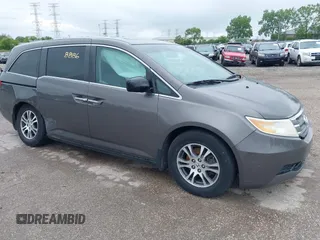2011 Honda Odyssey EX-L with VIN 5FNRL5H69BB099264, listed as a IAAI auction lot 42318886 with 178,159 mi miles and . Bid and sale history available at DreamBid. Image 1.