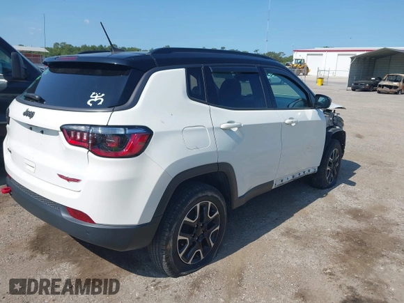 2021 Jeep Compass Trailhawk with VIN 3C4NJDDB7MT564467, listed as a IAAI auction lot 42330939 with 76,963 mi miles and . Bid and sale history available at DreamBid. Image 4.