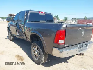 2015 Ram 2500 Laramie z VIN 3C6UR5FL6FG708769, wystawiony jako IAAI lot #42299173 z przebiegiem 101 660 mil mil oraz . Historia ofert i sprzedaży dostępna na DreamBid. Obrazek 3.